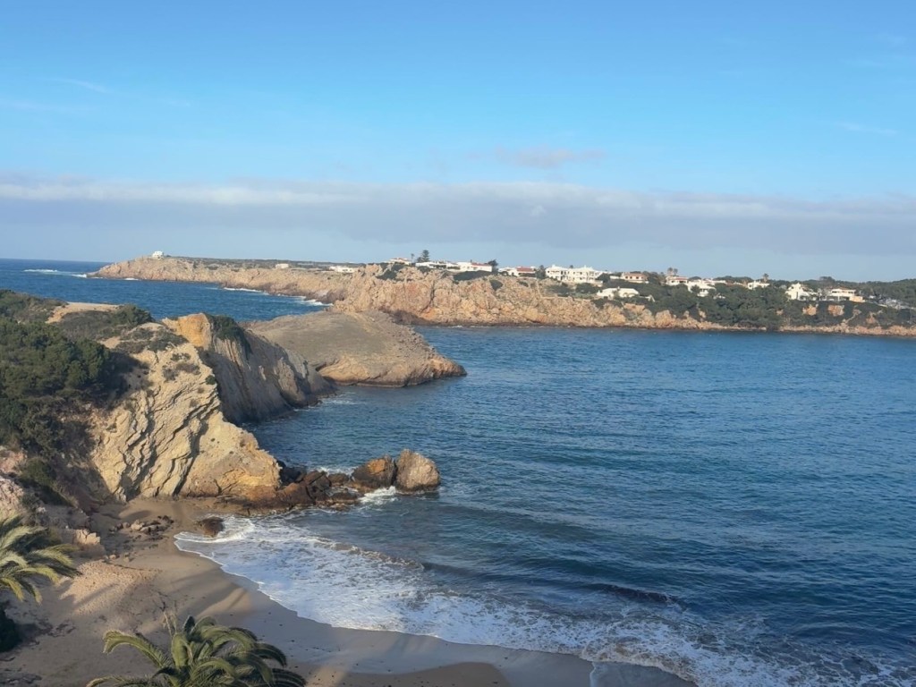 Cliff view from White Sands Beach Club in Menorca, Spain